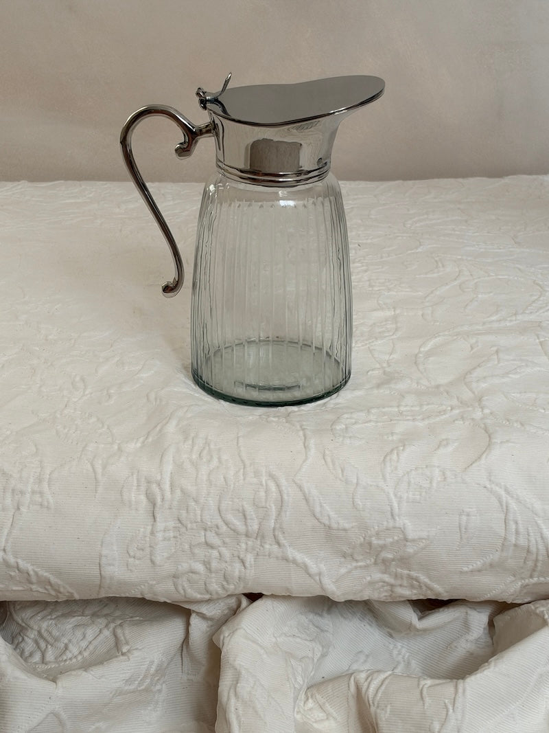 קנקן שתייה קטן Portofino מזכוכית עם מכסה בציפוי ניקל
